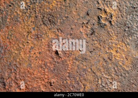 Corroded and scratched metal sheet. Rusted iron background Stock Photo