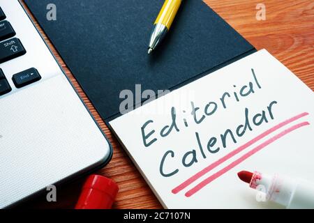 Editorial calendar or publishing schedule for content in the notebook. Stock Photo