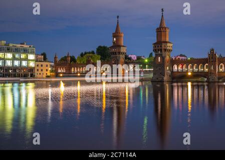 Oberbaum Bridge over the Spree River in Berlin, Germany at night. Stock Photo