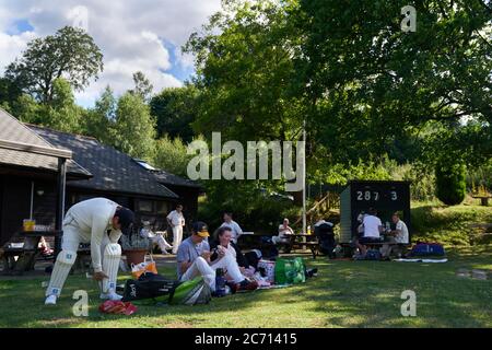 Abinger Hammer Cricket Club play Worplesdon & Burpham cricket club, Surrey. Stock Photo