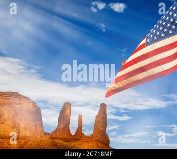 American flag in the Monument Valley landscape, USA. Stock Photo