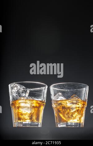 Glass of whisky on black background, copy space Stock Photo