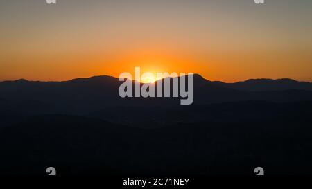 Sunset as seen from the summit of Mount Nemrut in Adiyaman City, Turkey Stock Photo