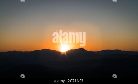 Sunset as seen from the summit of Mount Nemrut in Adiyaman City, Turkey Stock Photo