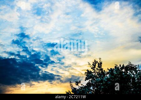 A beautiful sunset sky developing at the end of a summer's day. Stock Photo