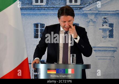 Meseberg, Germany. 13th July, 2020. Italy's Prime Minister Giuseppe Conte speaks at the joint press conference with Germany's Chancellor after her talks at the Federal Government Guest House at Meseberg Castle. Credit: Tobias Schwarz/AFP pool/dpa/Alamy Live News Stock Photo