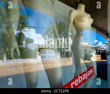 closed, empty shops in the formerly well visited holiday resort Cala d'Or on the south-east coast of Majorca. early clearance sales without customers. Stock Photo