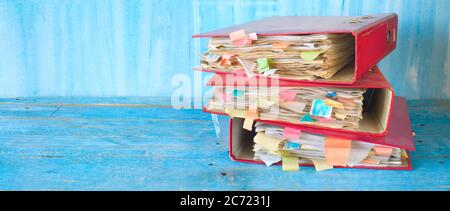 messy file folders and documents,  bureaucracy and red tape concept. good copy space Stock Photo