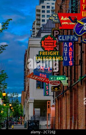 Vintage neon signs, Neon Sign Museum, Fourth St. Promenade, Edmonton, Alberta, Canada Stock Photo