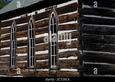 Building feature of the weathered wooden log cabin church. Stock Photo