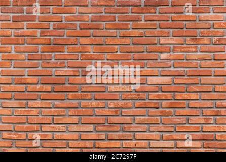 The background of the brick wall made from clay, arranged in a wall background Stock Photo