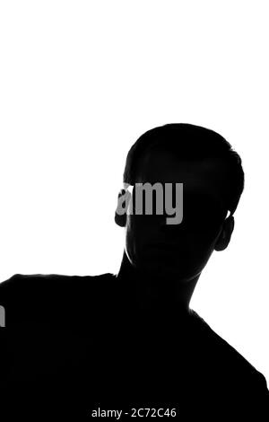 Portrait of a young man in front view diagonally - silhouette Stock Photo