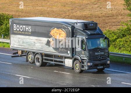 Booths supermarket Delivery. food truck van approaching depot in ...