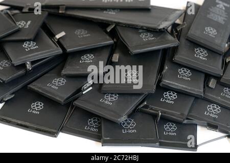 Close up of old used lithium polymer batteries of mobile phones preparation for recycling. Selective focus Stock Photo