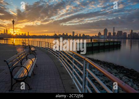 Beautiful sunrise over New York City viewed from Newport, New Jersey Stock Photo