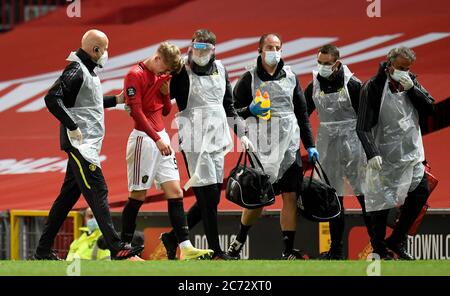 Manchester United S Brandon Williams Leaves The Field With A Head Injury After A Collision During The Premier League Match At Old Trafford Manchester Stock Photo Alamy