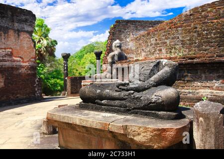 Sri Lanka travel and landmarks -  ancient city of Polonnaruwa, UNESCO World Heritage Site. Buddha statue' ruins in Vatadage temple Stock Photo