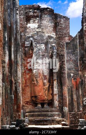 Sri Lanka travel and landmarks -  ancient city of Polonnaruwa, UNESCO World Heritage Site. Buddha statue carved in the rock, Lankatilaka Vihara temple Stock Photo