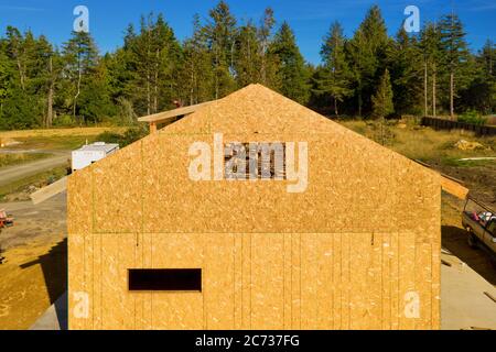 New construction home frame in a rural area Stock Photo