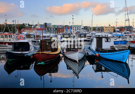 Recreational and fishing boats docking in the harbor of Torshavn.Torshavn.Streymoy.Faroe Islands.Territory of Denmark Stock Photo