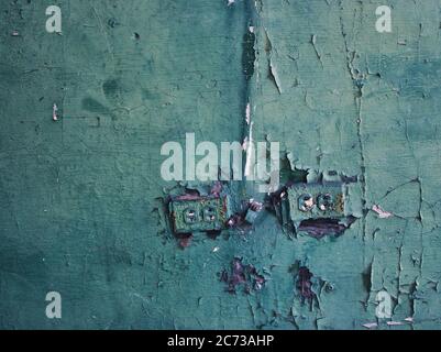 Electric outlets on a plaster wall in an abandoned house Stock Photo