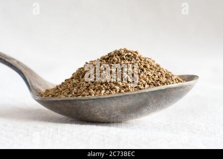 Anise Seeds on a Spoon Stock Photo
