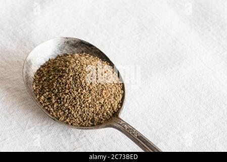Anise Seeds on a Spoon Stock Photo