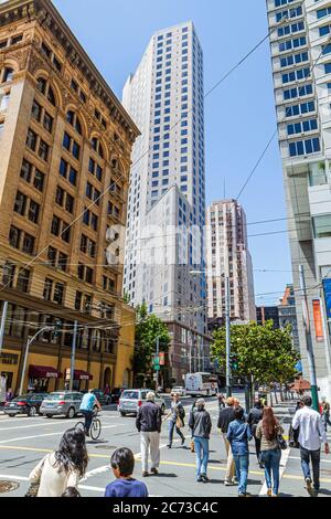 San Francisco California,Mission Street,downtown,street scene,intersection,crossing,high rise skyscraper skyscrapers building buildings traffic,bicycl Stock Photo