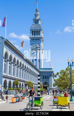 San Francisco California,101 The Embarcadero,Ferry building,1898,clock,terminal,tower,Arthur Page Brown,arched windowmarketplace,pedicab,cabs,transpor Stock Photo