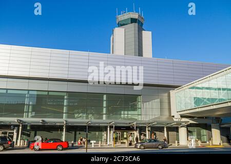 San Francisco California,San Francisco International Airport,SFO,aviation,terminal,outside exterior,front,entrance,design,control tower,modern,drop of Stock Photo