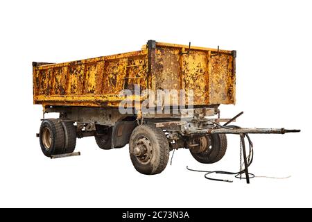 Old yellow heavy truck semi-trailer on a white background Stock Photo