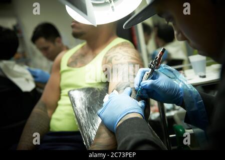 What goes on in Tattoo World, a tattoo parlour in Sydney Australia. Stock Photo