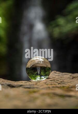 Waterfall through a looking glass Stock Photo