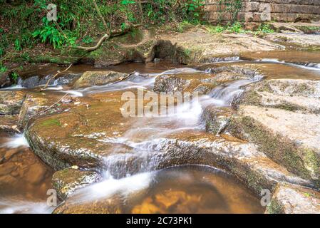 Falling Foss waterfall, rocks, flowing river & May Beck stream Stock Photo