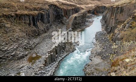 Studlagil basalt canyon, Iceland. This is a rare volcanic basalt column formation Stock Photo