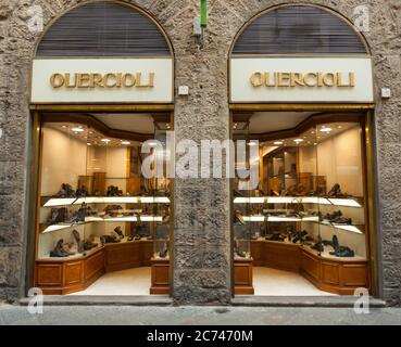 Florence, Italy - 04 November, 2017: Quercioli in via calzaiuoli, shop specializing in footwear craftsmanship. All shoes are handmade and in leather. Stock Photo