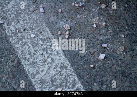 Close-up asphalt road with white edge line. Stock Photo