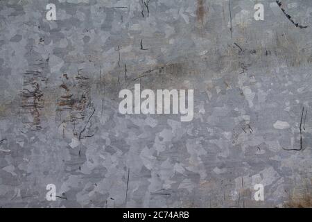 Texture of old iron plate with wear marks. With an iridescent surface. Stock Photo
