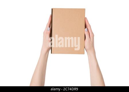 Rectangular box in female hands. Top view. Isolate Stock Photo