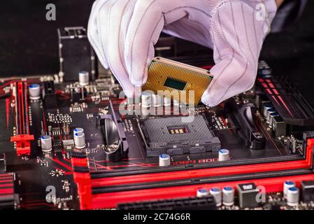 A CPU is mounted on a mainboard Stock Photo