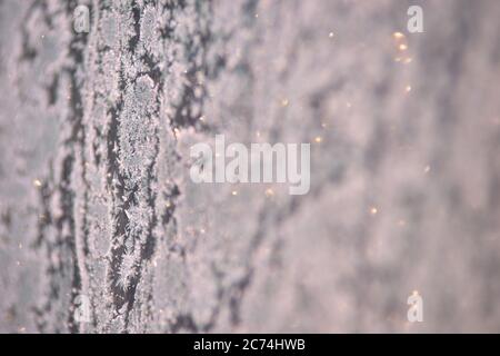 Snowflakes on glass. Brilliant texture. White color Stock Photo