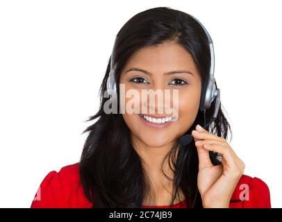 Portrait of a smiling female customer representative with phone headset chatting on line with client isolated on white background. Stock Photo