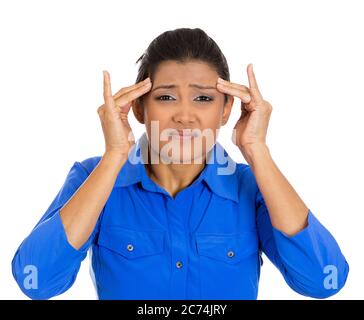 Closeup portrait of worried young woman having bad headache feeling stressed language Stock Photo