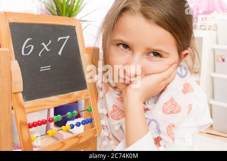 young school frustrated girl, problems to do math, Germany Stock Photo