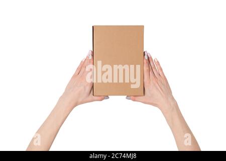Rectangular boxes in female hands. Top view. Isolate Stock Photo