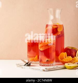 Stewed fruits in Glass Tube on pastel background side view copy space Stock Photo