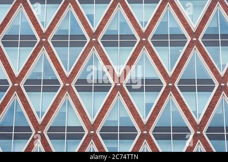 Windows of modern city hall of Gouda, Holland. Pattern inspired by the famous dutch syrup waffles or stroopwafels. Stock Photo