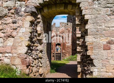 Hailes Castle, East Lothian, Scotland, United Kingdom, 14th July 2020. Historic Environment Scotland announces re-openings: from tomorrow over 200 unmanned properties will reopen, with Edinburgh, Urquhart & Stirling Castles reopening on August 1st. Another 23 properties will reopen during August & September at dates yet to be announced. Hailes Castle is a ruined castle, originally 14th century. A view looking through ruined arched doorways Stock Photo