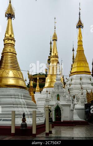 The magnificent gold plated stupas surrounding the Shwedagon Pagoda in Yangon, Myanmar, formally Rangoom, Burma Stock Photo