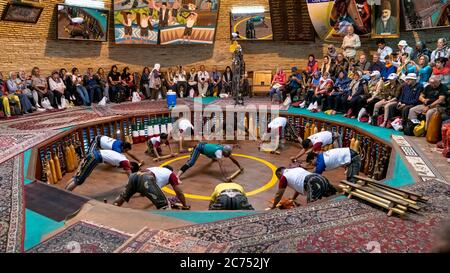 Yazd, Iran - May 2019: Pahlevani and zoorkhaneh rituals. Traditional Iranian system of athletics originally used to train warriors. Stock Photo